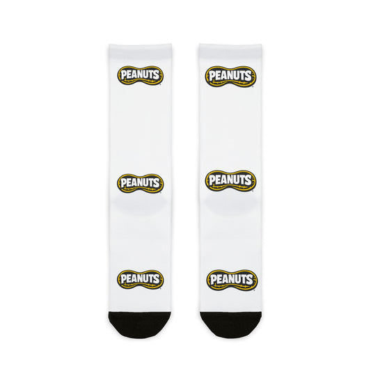 Peanuts Logo Sublimation Crew Socks — White Crew Socks with Repeating "Peanuts" Badge